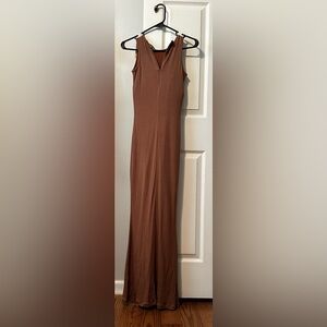 Size Small, Brown, Popilush form fitting dress. Never been worn.
